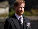 FILE PHOTO: Britain's Prince Harry walking in the procession at Windsor Castle, Berkshire, during the funeral of Britain's Prince Philip, who died at the age of 99, Britain, April 17, 2021. 
