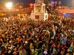 Devotees gather to offer prayers during Ganga aarti at Kumbh Mela, in Haridwar.