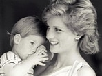 Britain's Princess Diana holds Prince Harry during a morning picture session at Marivent Palace, where the Prince and Princess of Wales are holidaying as guests of King Juan Carlos and Queen Sofia, in Mallorca, Spain August 9, 1988.(Reuters File Photo) Britain's Princess Diana holds Prince Harry during a morning picture session at Marivent Palace, where the Prince and Princess of Wales are holidaying as guests of King Juan Carlos and Queen Sofia, in Mallorca, Spain August 9, 1988.(Reuters File Photo)