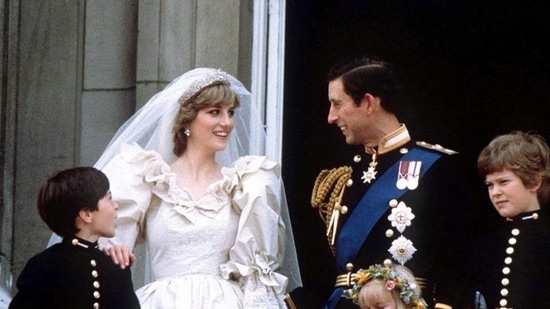 Prince Charles and Princess Diana stand on the balcony of Buckingham Palace in London, following their wedding at St. Pauls Cathedral. (REUTERS)