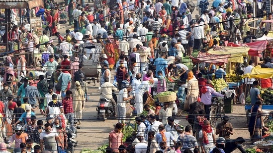 People flouting lockdown norms to buy essential items amid the rise in Covid-19 cases, in Patna (ANI Photo) People flouting lockdown norms to buy essential items amid the rise in Covid-19 cases, in Patna (ANI Photo)