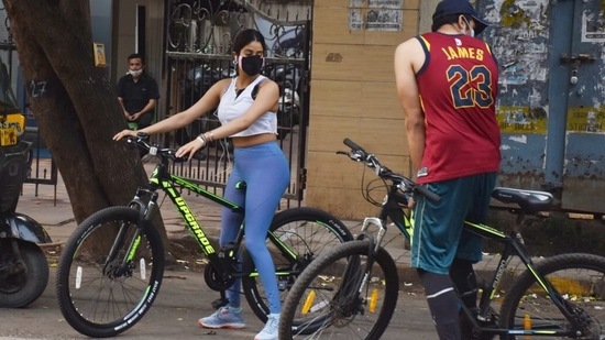 The Dhadak actor tied her hair in a plait and completed her outfit by stepping into a pair of grey sneakers.(Varinder Chawla)