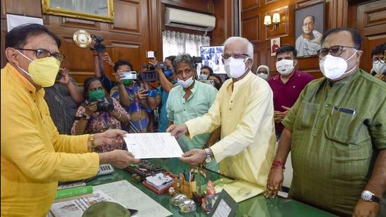 TMC MLA Sovandeb Chattopadhyay from Bhowanipore constituency submits his resignation to Speaker Biman Banerjee and minister Partha Chatterjee in Kolkata on Friday. (PTI PHOTO.)