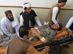 People push a stretcher carrying a victim who was injured in a bomb blast during a pro-Palestinian rally in which six people were killed and another 14 wounded, in Chaman of Pakistan's Balochistan province near the Afghanistan border, in Quetta. People push a stretcher carrying a victim who was injured in a bomb blast during a pro-Palestinian rally in which six people were killed and another 14 wounded, in Chaman of Pakistan's Balochistan province near the Afghanistan border, in Quetta.