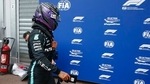 Mercedes driver Lewis Hamilton of Britain walks near his team garage after the qualifying session at the Monaco racetrack.(AP) Mercedes driver Lewis Hamilton of Britain walks near his team garage after the qualifying session at the Monaco racetrack.(AP)