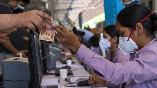 A beneficiary registers for Covid-19 vaccination at a centre set up at the BLK Super Speciality Hospital in New Delhi,on May 21. Private hospitals administering vaccines to people in the age group of 18-44 will however continue to function.(Sumit Dayal / Bloomberg)