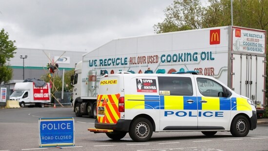 A police car is seen outside a McDonald's distribution site in Hemel Hempstead, Hertfordshire, Britain.(Reuters)