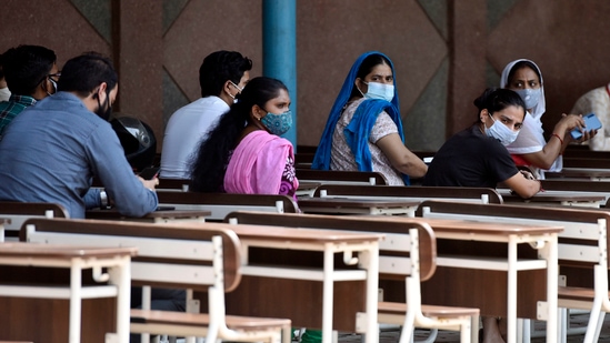 People waiting for their turn to be vaccinated against Covid-19, at the Govt. Boys Senior Secondary School in Malviya Nagar, New Delhi on May 21. Of the 5 million jabs, only 1.13 million, or 23%, are shots administered as second doses, HT reported.(Sanjeev Verma / HT Photo)
