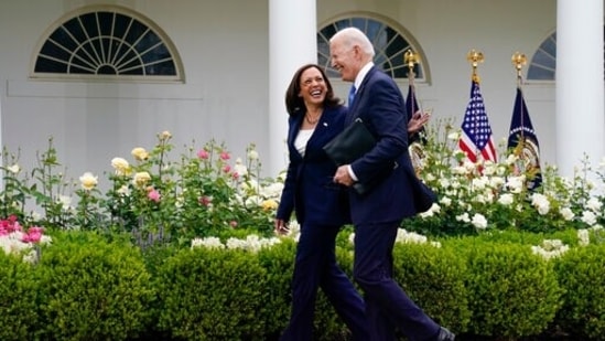 President Joe Biden walks with Vice President Kamala Harris after speaking on updated guidance on face mask mandates and Covid-19 response, in the Rose Garden of the White House in Washington. (AP) President Joe Biden walks with Vice President Kamala Harris after speaking on updated guidance on face mask mandates and Covid-19 response, in the Rose Garden of the White House in Washington. (AP)