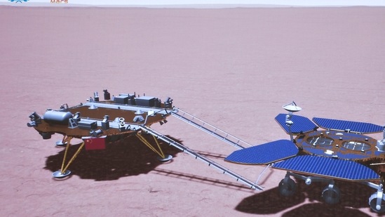 China's Zhurong rover is depicted on the surface of Mars. China's first Mars rover has driven down from its landing platform and is now roaming the surface of the red planet, China's space administration said. (AP) China's Zhurong rover is depicted on the surface of Mars. China's first Mars rover has driven down from its landing platform and is now roaming the surface of the red planet, China's space administration said. (AP)