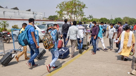 The workers reached Viratnagar on Bihar-Nepal border and boarded the bus to travel to Dumka, around 245 km away. (PTI Photo) The workers reached Viratnagar on Bihar-Nepal border and boarded the bus to travel to Dumka, around 245 km away. (PTI Photo)
