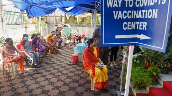 Beneficiaries wait to receive Covid-19 vaccine dose at a centre in Delhi. (PTI) Beneficiaries wait to receive Covid-19 vaccine dose at a centre in Delhi. (PTI)