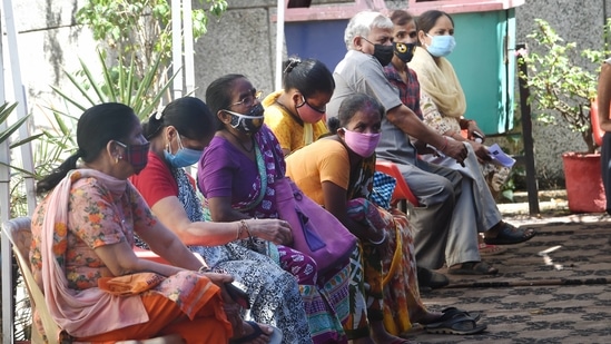 In Delhi, 49,957 beneficiaries received a jab in the last 24 hours. In picture - Beneficiaries wait to receive Covid-19 vaccine dose in New Delhi. (PTI) In Delhi, 49,957 beneficiaries received a jab in the last 24 hours. In picture - Beneficiaries wait to receive Covid-19 vaccine dose in New Delhi. (PTI)