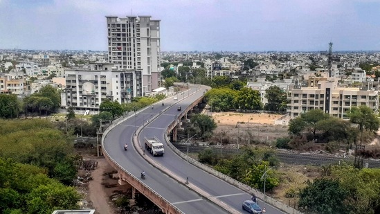 Flyover wears a deserted look during Covid-induced lockdown in Nagpur, Saturday. May 22, 2021. (PTI) Flyover wears a deserted look during Covid-induced lockdown in Nagpur, Saturday. May 22, 2021. (PTI)