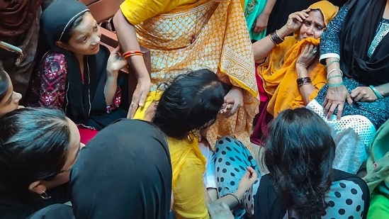 People attend funeral of the vegetable vendor, after family members alleged that he died in police custody, in Unnao district, Saturday, May 22, 2021. (PTI) People attend funeral of the vegetable vendor, after family members alleged that he died in police custody, in Unnao district, Saturday, May 22, 2021. (PTI)