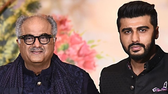 Boney Kapoor and Arjun Kapoor pose together.