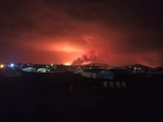 A general view from the Goma International Airport shows smoke and flames at the volcanic eruption of Mount Nyiragongo near Goma, in the Democratic Republic of Congo. (REUTERS) A general view from the Goma International Airport shows smoke and flames at the volcanic eruption of Mount Nyiragongo near Goma, in the Democratic Republic of Congo. (REUTERS)