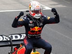 Red Bull's Max Verstappen celebrates winning the Monaco Grand Prix.(Pool via REUTERS)