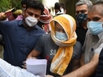 Olympic wrestler Sushil Kumar and his associate Ajay Kumar (back) in the custody of Delhi Police Special cell in New Delhi