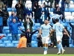 Manchester City's Sergio Aguero celebrates after scoring during the English Premier League match against Everton.(AP) Manchester City's Sergio Aguero celebrates after scoring during the English Premier League match against Everton.(AP)