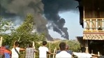 People look at thick columns of black smoke from Hkamti, Sagaing, Myanmar. (REUTERS) People look at thick columns of black smoke from Hkamti, Sagaing, Myanmar. (REUTERS)