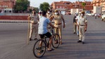 The penalty for not wearing a mask in public places has been increased to <span class='webrupee'>₹</span>1000 from <span class='webrupee'>₹</span>500. In picture - Police on duty during the Covid-19 curfew in Jaipur.(PTI)