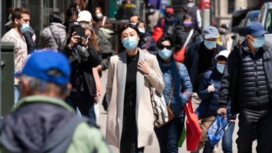 Many states have largely dropped orders to wear masks and stay distanced from other people. (AP)