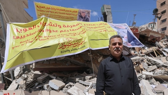 Last Tuesday, Samir al-Mansour watched in disbelief as his bookshop and publishing house he had poured his life into went up in smoke.(AFP) Last Tuesday, Samir al-Mansour watched in disbelief as his bookshop and publishing house he had poured his life into went up in smoke.(AFP)