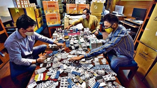 Uday foundation staff sort medicines at Sarvodya Enclave, in New Delhi, India, on Friday, May 21, 2021. (Photo by Sanjeev Verma/ Hindustan Times)