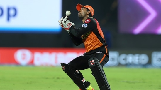 Wriddhiman Saha takes a catch to dismiss Rahul Tripath during match 3 of the Indian Premier League 2021 between Sunrisers Hyderabad and Kolkata Knight Riders.(PTI) Wriddhiman Saha takes a catch to dismiss Rahul Tripath during match 3 of the Indian Premier League 2021 between Sunrisers Hyderabad and Kolkata Knight Riders.(PTI)