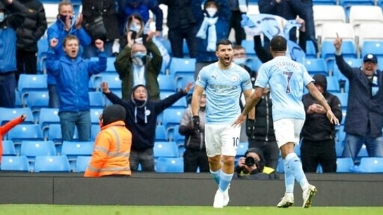 Manchester City's Sergio Aguero celebrates after scoring during the English Premier League match against Everton.(AP)
