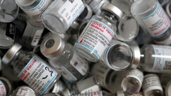 Empty vials of the Moderna COVID-19 vaccine lie in a box during a vaccine campaign. (AP) Empty vials of the Moderna COVID-19 vaccine lie in a box during a vaccine campaign. (AP)
