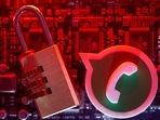 A 3D printed Whatsapp logo and a padlock are placed on a computer motherboard in this illustration picture taken May 4, 2021. 