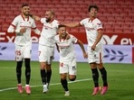 Sevilla players celebrate(@SevillaFC_ENG) Sevilla players celebrate(@SevillaFC_ENG)
