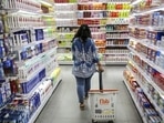 A shopper walks through an aisle displaying personal care goods at a supermarket in Mumbai. (Bloomberg File Photo) A shopper walks through an aisle displaying personal care goods at a supermarket in Mumbai. (Bloomberg File Photo)
