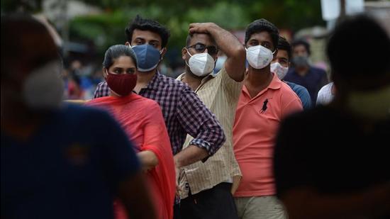 People wait to get themselves inoculated at a Covid vaccination camp in Chennai on Monday, May 24. (AFP) People wait to get themselves inoculated at a Covid vaccination camp in Chennai on Monday, May 24. (AFP)