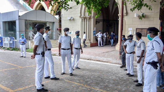 Police personnel guard at the Calcutta High Court during a hearing on the Narada scam case in Kolkata. (PTI) Police personnel guard at the Calcutta High Court during a hearing on the Narada scam case in Kolkata. (PTI)