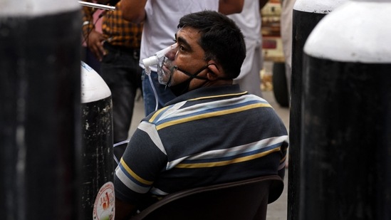 A Covid-19 patient on oxygen support provided by a NGO in Amritsar on May 23. In the last few days, India’s daily Covid-19 death toll has hovered around the 4000-mark, even crossing it on several days. (Narinder Nanu / AFP) A Covid-19 patient on oxygen support provided by a NGO in Amritsar on May 23. In the last few days, India’s daily Covid-19 death toll has hovered around the 4000-mark, even crossing it on several days. (Narinder Nanu / AFP)