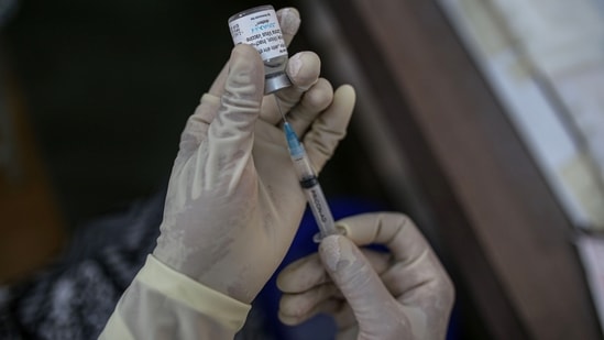 The Union health ministry said that on-site registration and appointment has now been enabled for the 18-44 years age group on the CoWin platform. In picture - A nurse prepares a dose of Covid-19 vaccine. (Bloomberg) The Union health ministry said that on-site registration and appointment has now been enabled for the 18-44 years age group on the CoWin platform. In picture - A nurse prepares a dose of Covid-19 vaccine. (Bloomberg)