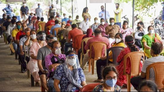 Beneficiaries wait to receive a dose of Covid-19 vaccine,at ESIS Hospital in Navi Mumbai, earlier this month. (File photo)