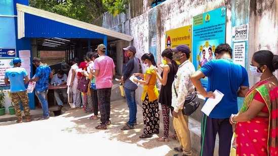 People wait to receive the first dose of Covid-19 vaccine in Birbhum on Monday. (PTI Photo) People wait to receive the first dose of Covid-19 vaccine in Birbhum on Monday. (PTI Photo)