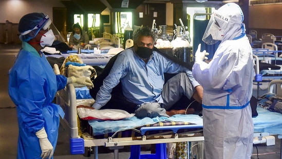 The active caseload in Delhi currently stands at 24,578. In picture - Health workers attend to a Covid-19 patient in New Delhi. (PTI) The active caseload in Delhi currently stands at 24,578. In picture - Health workers attend to a Covid-19 patient in New Delhi. (PTI)