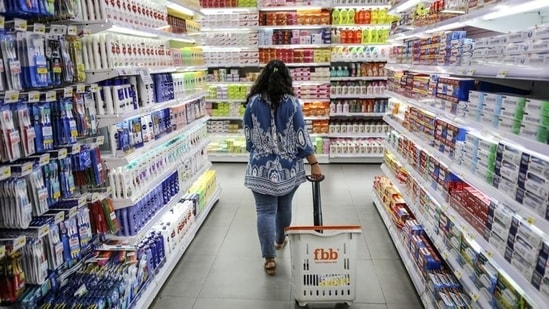 A shopper walks through an aisle displaying personal care goods at a supermarket in Mumbai. (Bloomberg File Photo) A shopper walks through an aisle displaying personal care goods at a supermarket in Mumbai. (Bloomberg File Photo)
