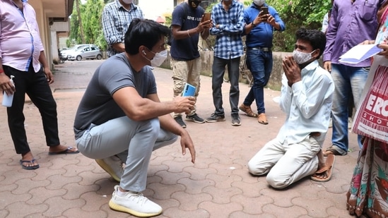 Sonu Sood met a few people outside his home on Sunday.