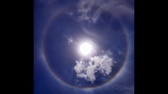 Hyderabad residents marvel as rainbow-coloured halo seen around the sun -  Oneindia News