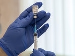 A medical worker prepares a shot of Russia's Sputnik V coronavirus vaccine.(AP) A medical worker prepares a shot of Russia's Sputnik V coronavirus vaccine.(AP)