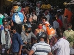People, mostly wearing face masks as a precaution against the coronavirus, crowd a vegetable market as they shop for essentials in Mumbai, India, Tuesday, May 25, 2021(AP) People, mostly wearing face masks as a precaution against the coronavirus, crowd a vegetable market as they shop for essentials in Mumbai, India, Tuesday, May 25, 2021(AP)