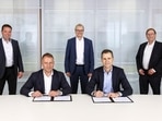 Hansi Flick (second from left) signs the contract. (Twitter/Germany) Hansi Flick (second from left) signs the contract. (Twitter/Germany)
