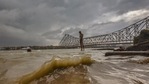 Storm-like weather conditions near Howrah bridge due to Cyclone Yaas in the Bay of Bengal, in Howrah. Storm-like weather conditions near Howrah bridge due to Cyclone Yaas in the Bay of Bengal, in Howrah.