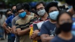 People wait to get themselves inoculated with the dose of Covishield Covid-19 coronavirus vaccine at a vaccination camp in a residential area in Chennai on May 24, 2021. (AFP)
